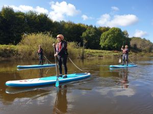 Ladies on a Guided Paddleboard trip on the Wye