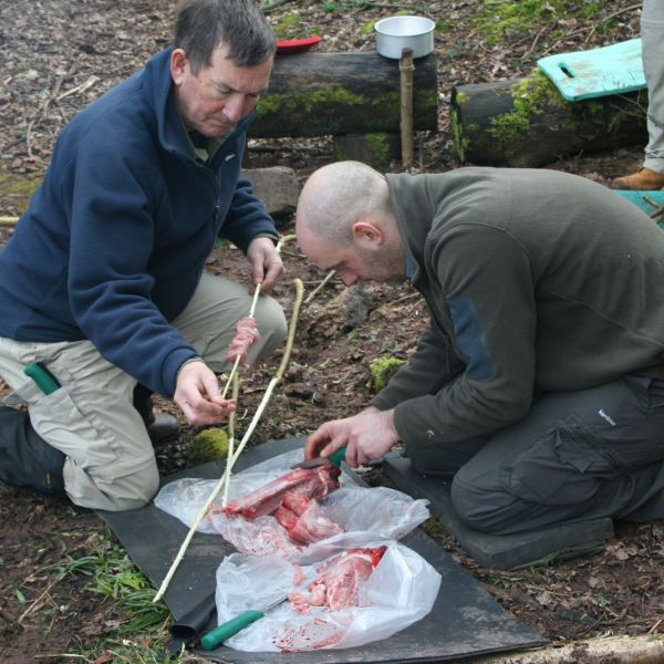 Preping the rabbits for the pot on a Bushcraft Session.