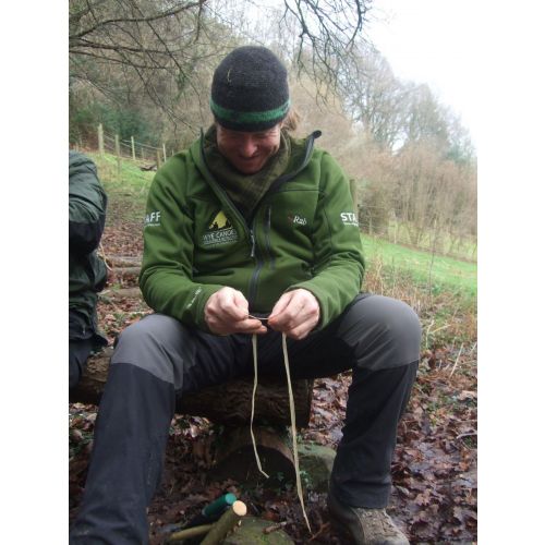 Learning how to make cordage on a bushcraft session.